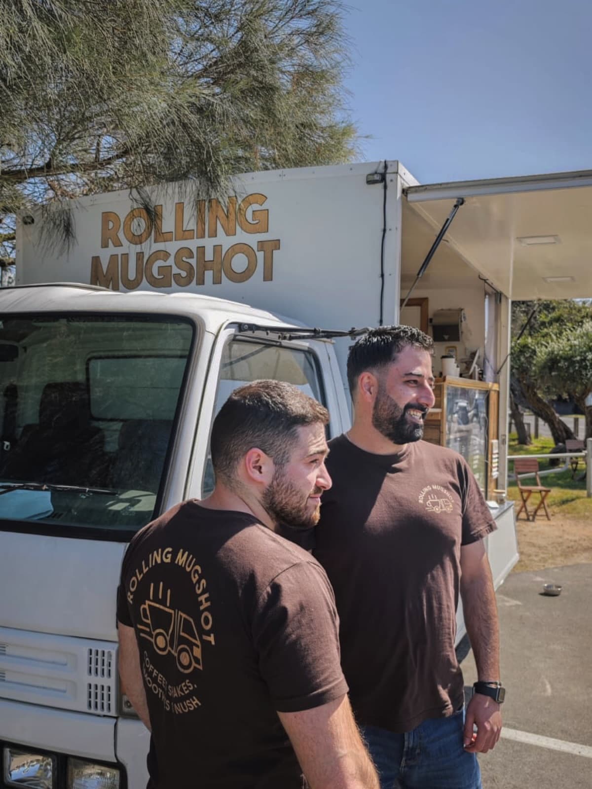 The Rolling Mugshot team by the truck